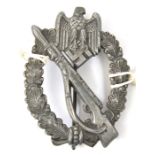 A Third Reich Infantry Assault badge, of polished zinc, by S.H.a. Co (Sohn, Heubach & Co,