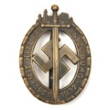 A Third Reich Coburg badge, (Coburger Abzeichen), bronzed finish with small maker’s mark. GC