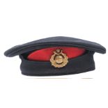 A scarce Other Rank’s blue cloth Brodrick cap of the Royal Marines Light Infantry, scarlet dummy “