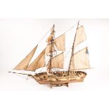A 1:50 scale model of a French 2-masted brig, Le Hussard. A well-constructed plank on frame wooden