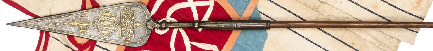 A Sudanese spearhead, c 1898,broad flat leaf shaped blade 13½”, inlaid with brass panels of