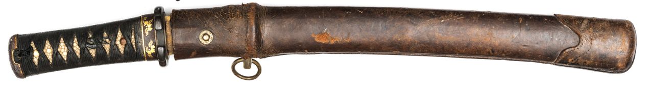 A Japanese sword Wakizashi, blade 14½”, unsigned, probably 16th Century. Iron Higo mounts to hilt,