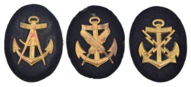 3 Third Reich gilt metal Naval Petty Officer trade badges, for Writer, Spotter, and Carpenter, on