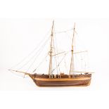 A 1:50 scale model of a French 2-masted brig.  A well-constructed plank on frame wooden model ship