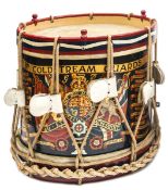 A George V painted brass side drum of the 1st Bn Coldstream Guards, bearing title scroll, crowned