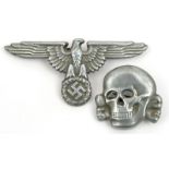 A Third Reich 1933 pattern SS aluminium alloy cap eagle, with indistinct RZM and SS marks, and an