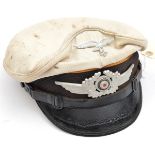 A Third Reich Luftwaffe Flight Section NCO’s summer issue peaked cap, with aluminium eagle and