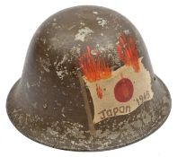A souvenir WWII Japanese civil defence alloy khaki helmet, overpainted with Japanese flag in