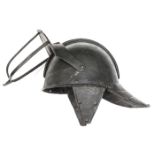 A Cromwellian lobster tail helmet, the domed 2 piece skull having low comb, hinged peak with
