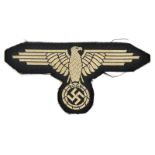 A Third Reich French made late war woven silk SS arm eagle. GC