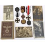 A Third Reich Iron Cross 2nd class, a WWI Iron Cross 2nd class, 12 WW1 Imperial German Army