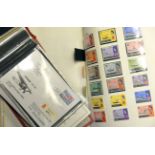 A large collection of postage stamps, mounted in various albums. GC