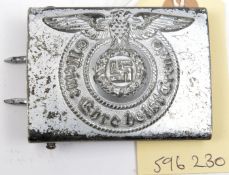 A Third Reich silver painted steel SS buckle, the back bearing RZM and SS marks and maker’s code “