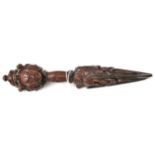 An interesting 19th century Tibetan carved and polished all darkwood exorcising dagger phurbu,
