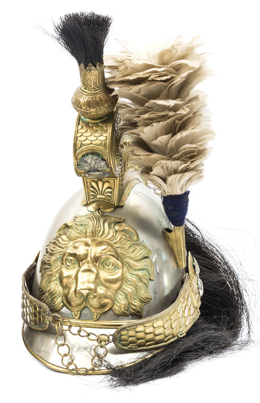 A 19th century Belgian cavalry trooper’s helmet, white metal skull and peaks, brass peak binding,