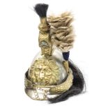 A 19th century Belgian cavalry trooper’s helmet, white metal skull and peaks, brass peak binding,