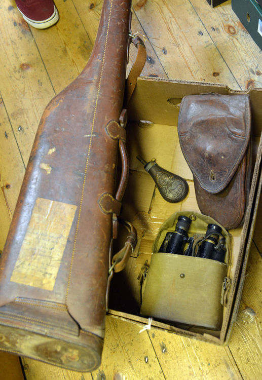 A “leg ‘o’ mutton” gun case, a WWII binocular in case, a reproduction powder flask and 2 pouches AF.