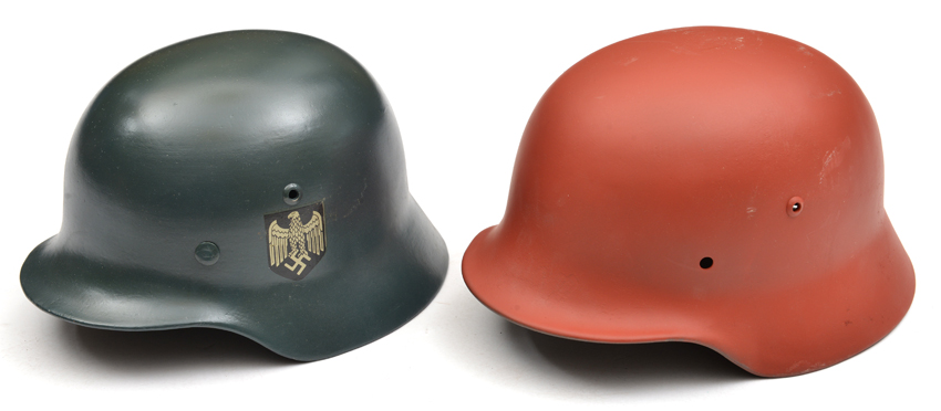 A Third Reich M1936 steel helmet, well refinished in army colours, GC (chinstrap not present);