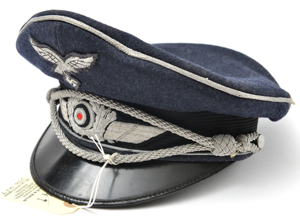 A Third Reich Luftwaffe officer’s peaked SD cap complete with bullion chin strap. GC