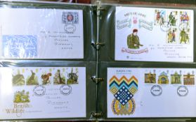 A quantity of First Day covers, in 4 leatherette loose leaf ring binders with title “Royal Mail