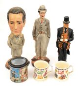 3 painted plaster figures: Charlie Chaplin in typical baggy suit with bowler hat and cane, 17”,