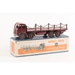 A Dinky Toys Foden Flat truck with chains (505). An example with an FG 2nd type cab in maroon with