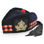 A scarce OR’s glengarry cap of the Calcutta Scottish, red, white and blue diced wool headband,
