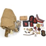 A WWII shoulder bag “Admiralty First Aid Outfit. Fleet Air Arm” d 1941; a WWII pair: Defence and War
