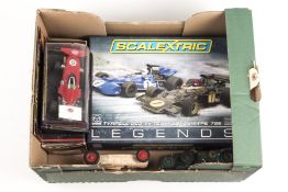 6 Scalextric Cars. A Legends 2-car set (C3479A). Comprising a Tyrrell 003 and a Team Lotus Type 72E.