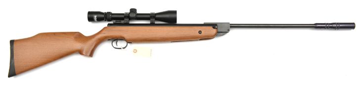 A .22” SMK20 break action air rifle, with no visible number, fitted with sound moderator and