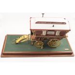 An impressive and finely detailed model of a gypsy caravan by Bruce Coombes. A wooden model of a