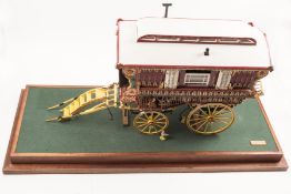 An impressive and finely detailed model of a gypsy caravan by Bruce Coombes. A wooden model of a