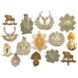 3 cap badges: all brass Queens (2, one slide missing) and R Fus; 3 Scottish glengarries Seaforths,