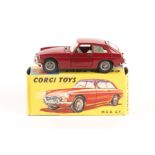 A Corgi Toys MGB GT (327). An example in red, suitcase missing. Boxed, minor/some wear. Vehicle VGC,