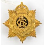 An officer’s gilt pouch badge of the Army Service Corps, black enamel centre backing, 3 screw studs.