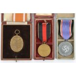 3 Third Reich medals: West Wall medal, with ribbon, in its fitted leatherette case with gold