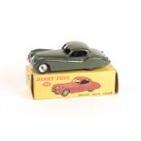 A Dinky Toys Jaguar XK120 (157). An example in sage green with gloss black base and spun wheels.