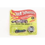 A scarce 1969 issue Mattel HotWheels ‘Exclusive Grand Prix Series Chaparral 2G. Finished in vacuum