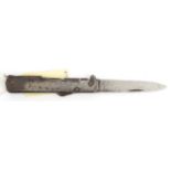 A WWI German folding trench knife, marked “Mercator DRGM” on the back, blade 4½” with locking