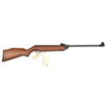 A .22” Webley Vulcan break action air rifle, number 023242, the stock with label attached “Gun