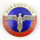 A scarce Third Reich pin back badge, for the Student World Games, Vienna, August 1939, in red, white