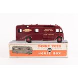 A Dinky Toys British Railways Express Horse Box (581). Maroon body with red wheels. 'Express Horse