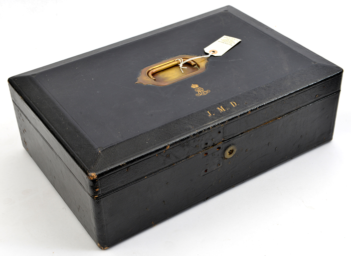 An official black dispatch box, 18” x 12” x 6” high, folding brass handle to top centre, impressed