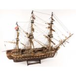 A model of a French man of war from 1785, Le Superbe. A detailed wooden kit built model with 3