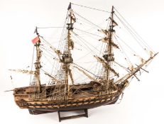 A model of a French man of war from 1785, Le Superbe. A detailed wooden kit built model with 3