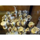 25 pieces of crested china, including Wilton China urn “Good Luck for Nuneaton” with dog, Grafton