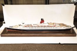 An impressive Museum/Board Room style waterline model of the ocean going liner Queen Elizabeth 2 (