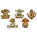 5 Irish cap badges: Leinster square scrolls, and do. all brass, Connaught, R Munster Fus and R