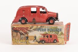 A Tri-ang Minic clockwork Fire Engine. Complete with rubber tyres, bell, locker covers and one