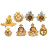 7 officer’s gilt/ silver plated cap badges: ERII RA, RE, RASC enamelled and WRAC, Geo VI RASC